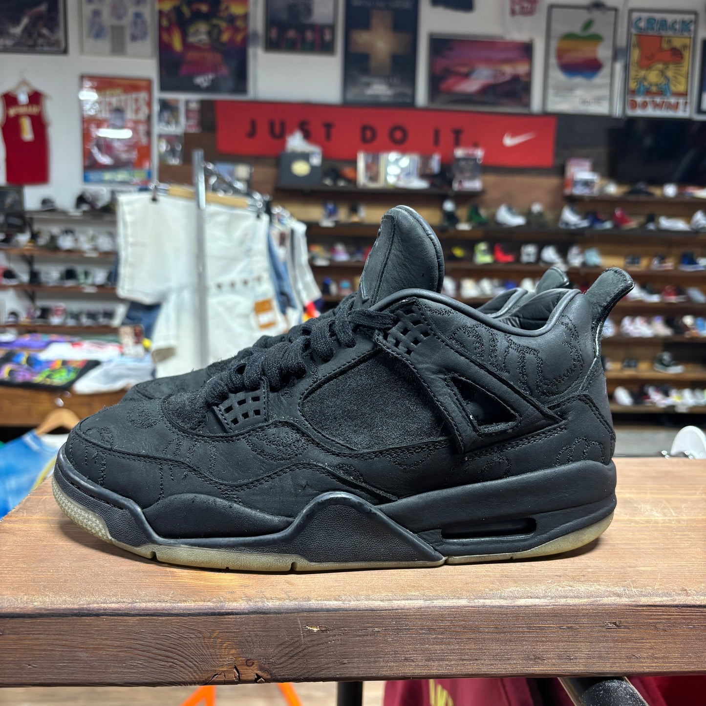 Jordan 4 'KAWS Black' Size 9