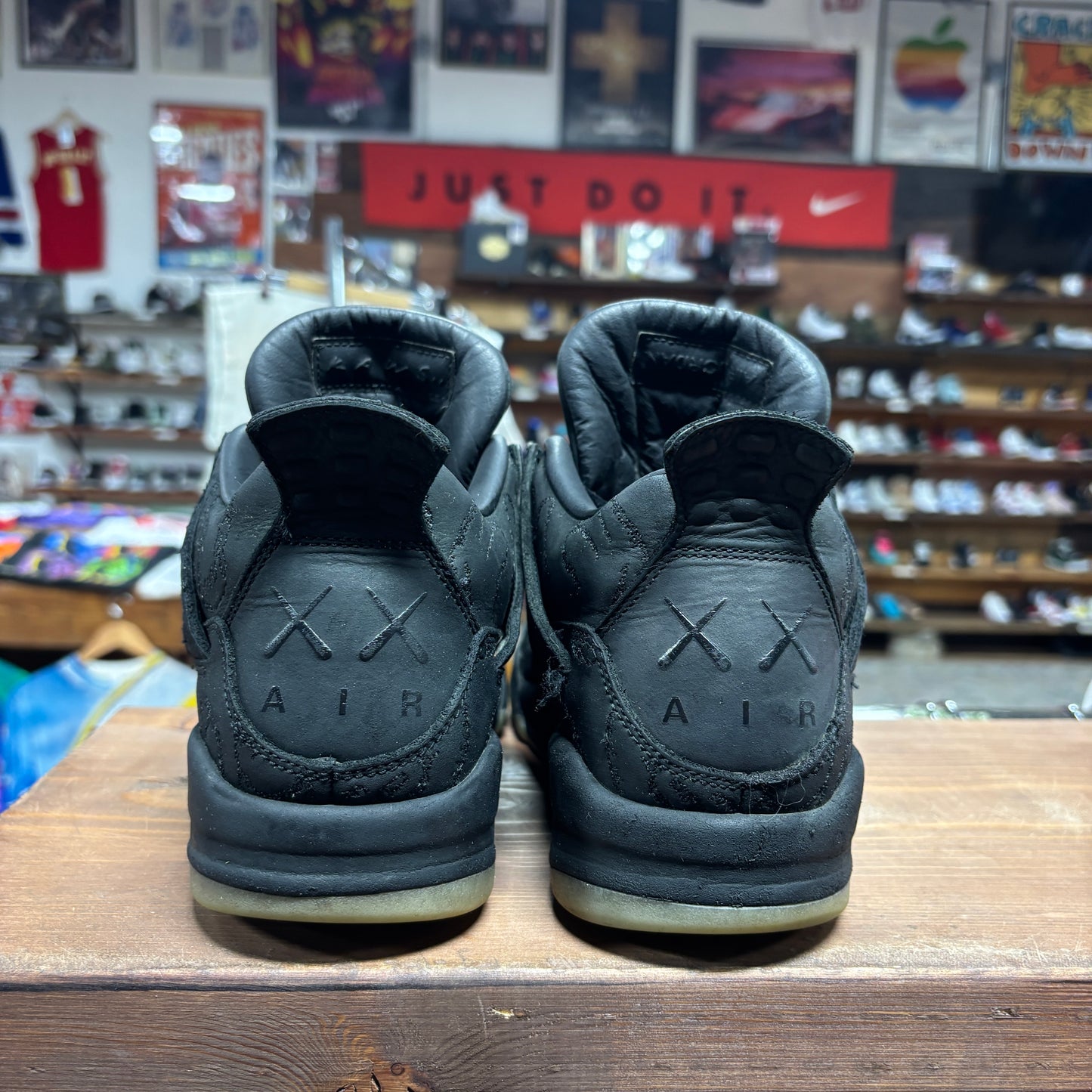 Jordan 4 'KAWS Black' Size 9
