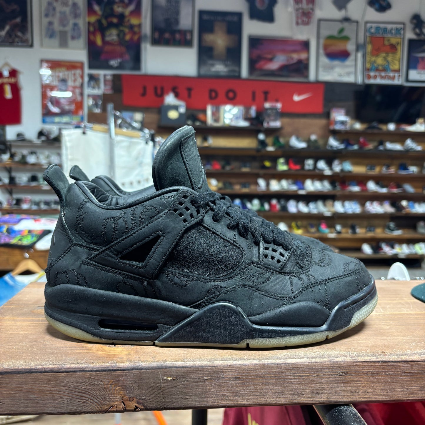 Jordan 4 'KAWS Black' Size 9