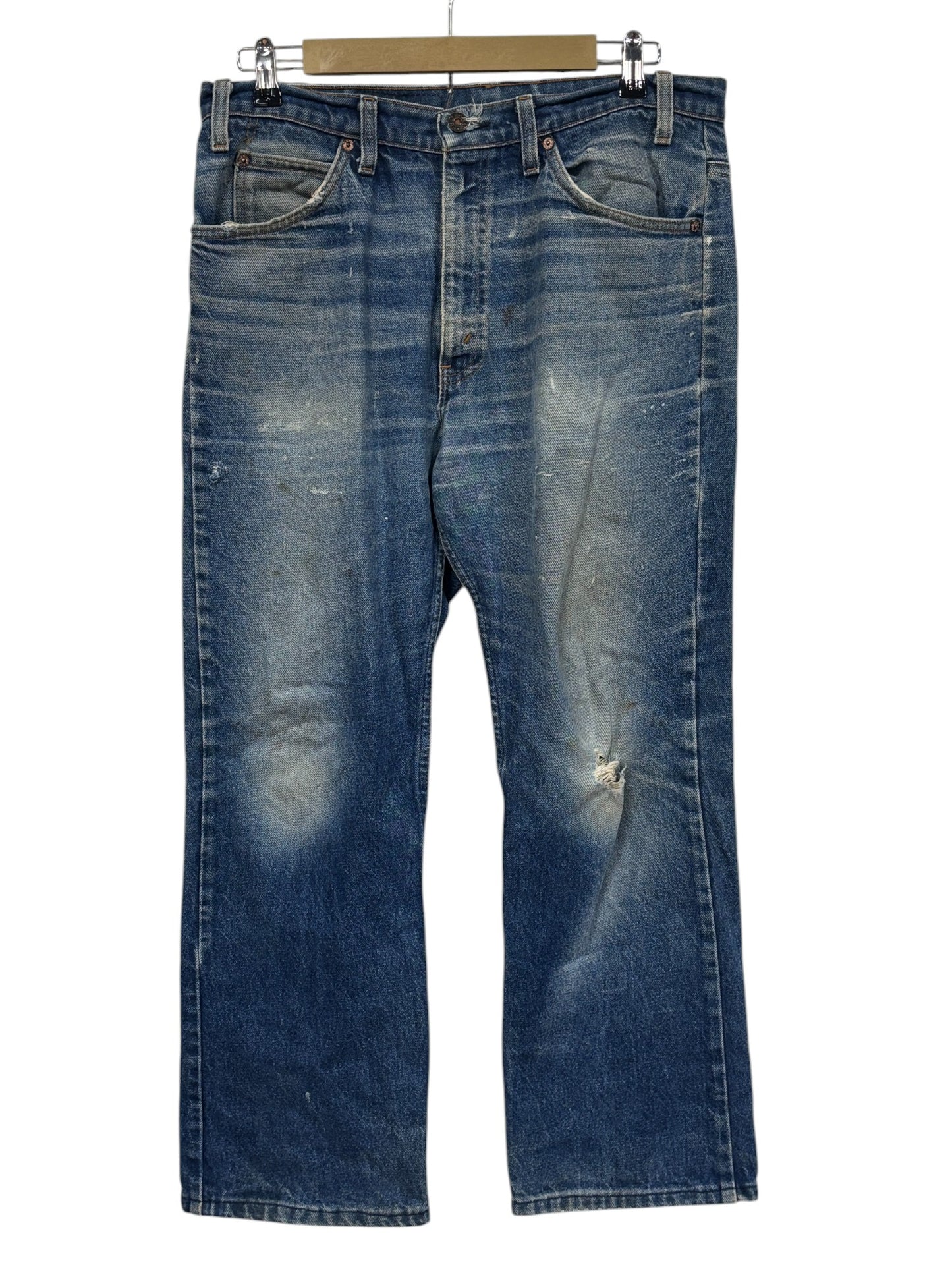 Vintage Levi's Made in USA Orange Tab Thrashed Denim Jeans Size 33x25