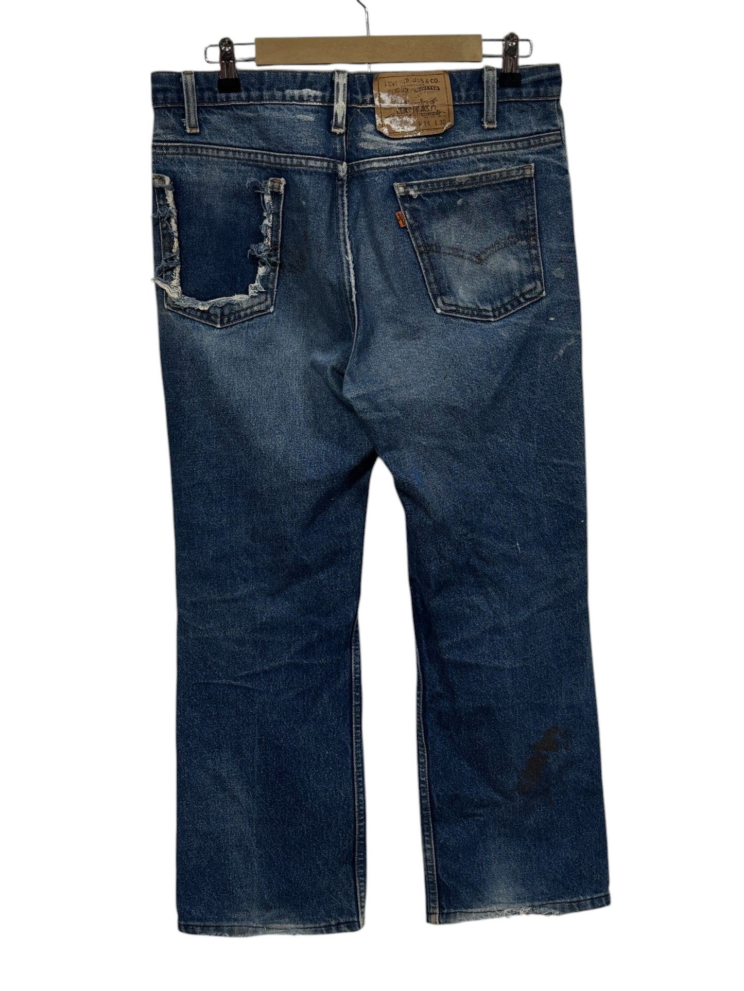 Vintage Levi's Made in USA Orange Tab Thrashed Denim Jeans Size 33x25